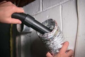 cleaning dryer duct with a vacuum