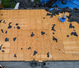 Roof Replacement process - tearing off the shingles and underlayment