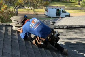 Close-up of roof underlayment and flashing installation layers